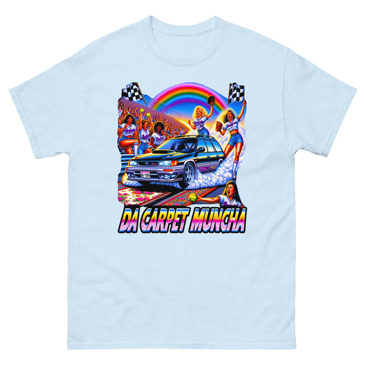 Da Carpet Muncha design wtih a subaru driving and ladies cheering around it printed on a t-shirt by Mcbarge shirts.